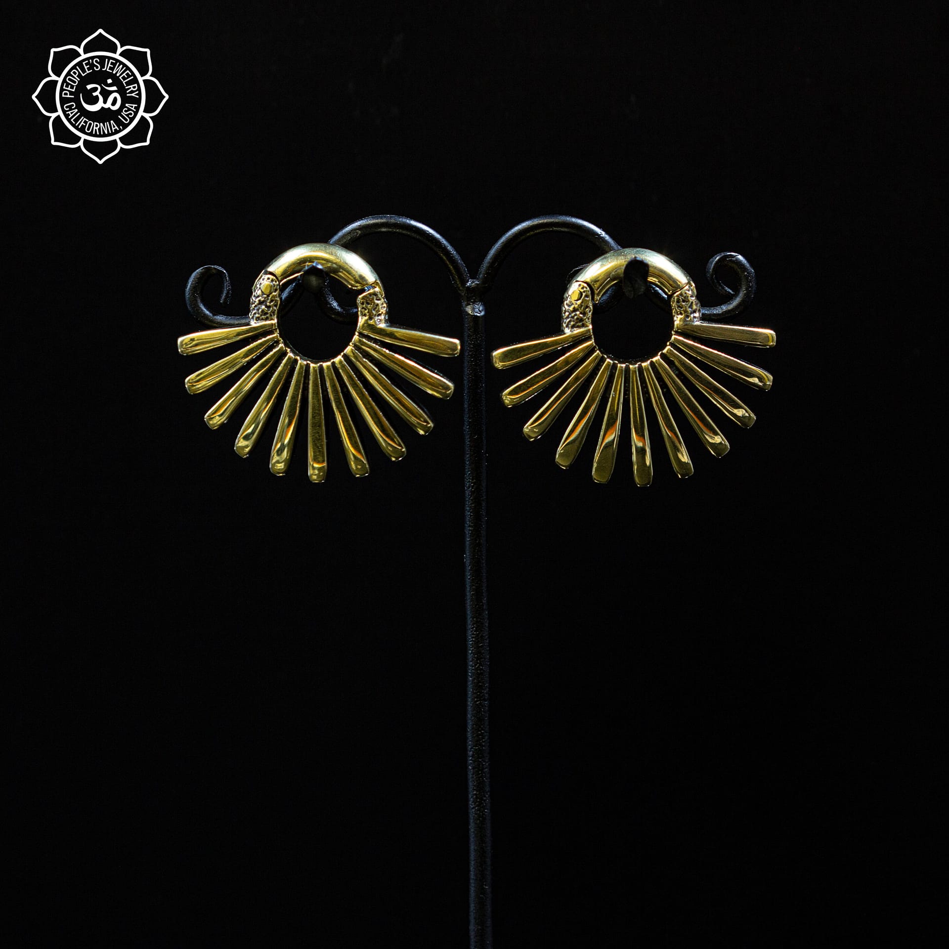 Yellow brass fan clickers