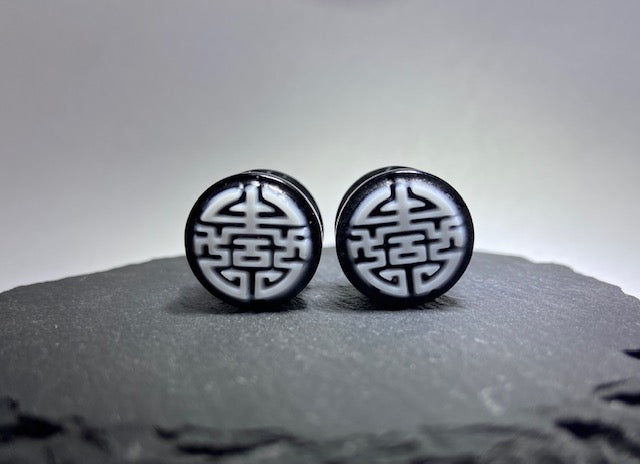 Chinese Swastika Plugs by Gorilla Glass