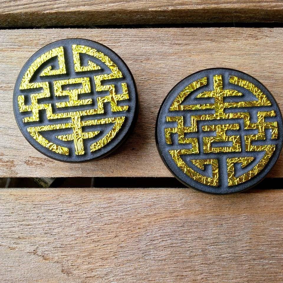 Chinese Swastika Plugs by Gorilla Glass